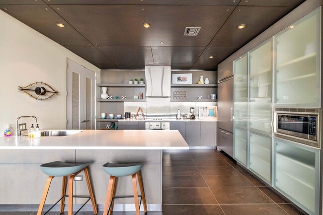 Building Photo - Rates Vary: $6,495 - $9,995