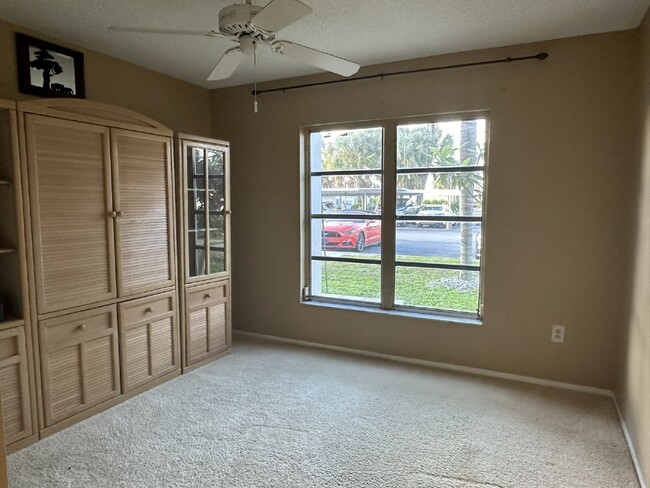 Building Photo - "Charming 2-Bed, 2-Bath Furnished Condo wi...