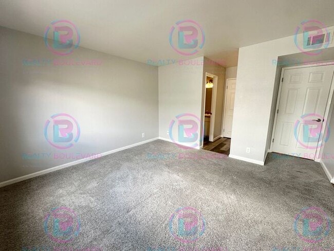 Building Photo - Contemporary 2-Bed Condo with Garage & Poo...