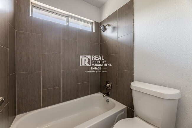 Building Photo - Recently Updated Plano Property with Modern Features and Serene Surroundings