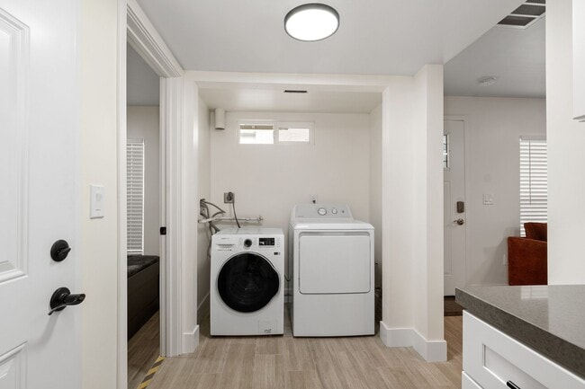 Building Photo - Beachside 3BR Home | Remodeled | AC | Garage Parking | Walk to Boardwalk