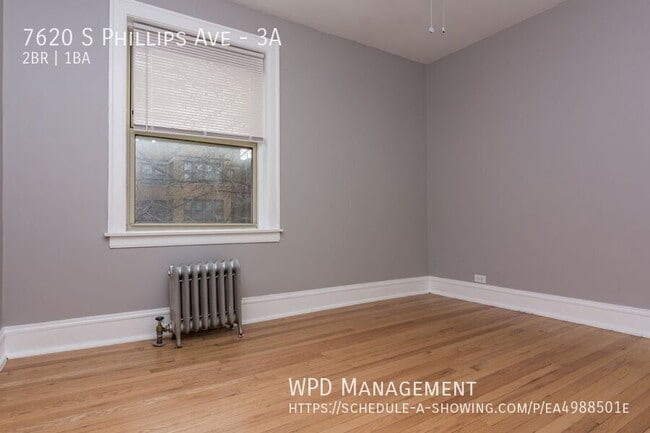 Building Photo - 7620 S Phillips Ave