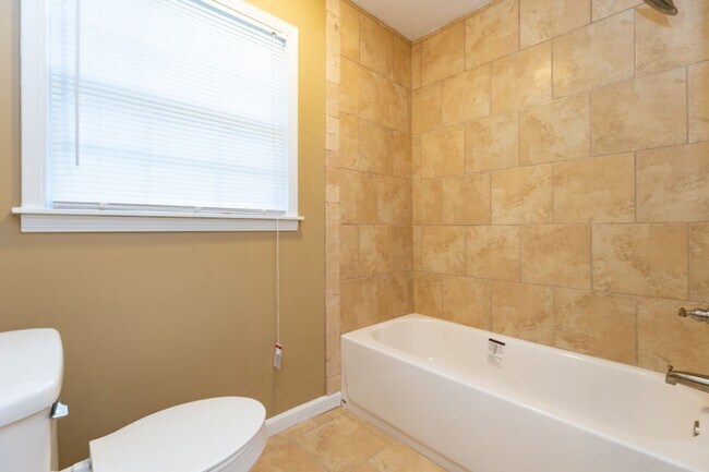Building Photo - Pet-Friendly 3BR with Bonus Room, Deck & G...