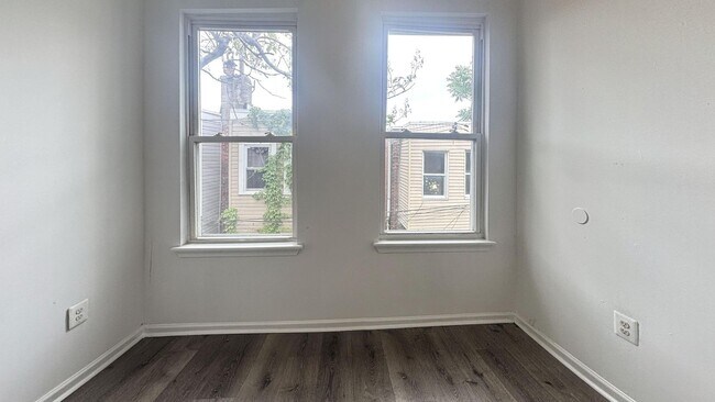 Building Photo - Modern Four-Bedroom Row Home in Kingsessing