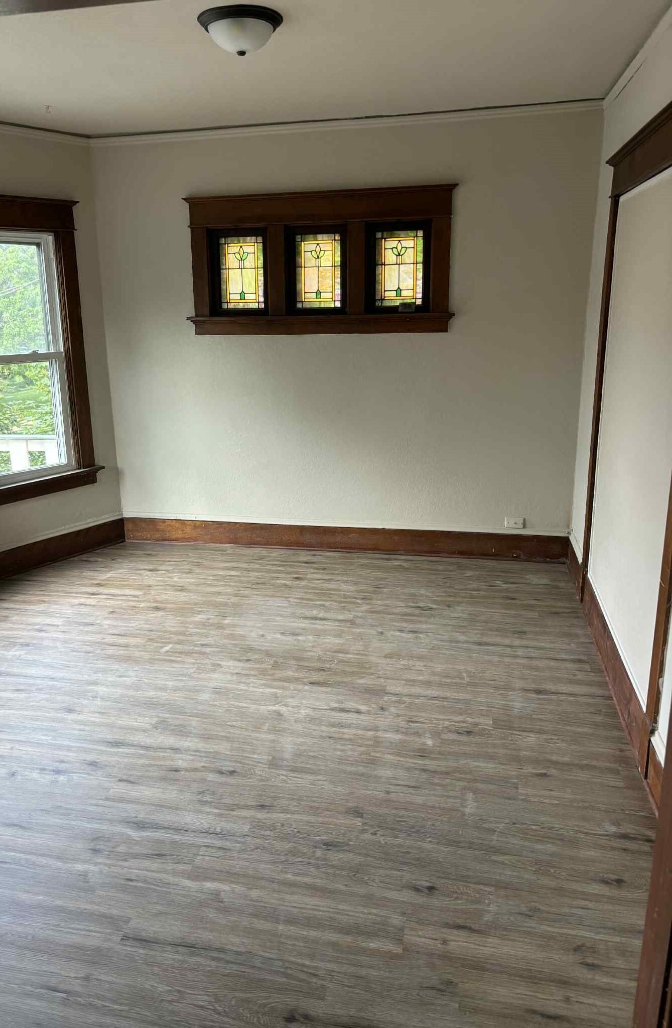 front bedroom - overlooks front porch - large size - 633 E Burleigh St