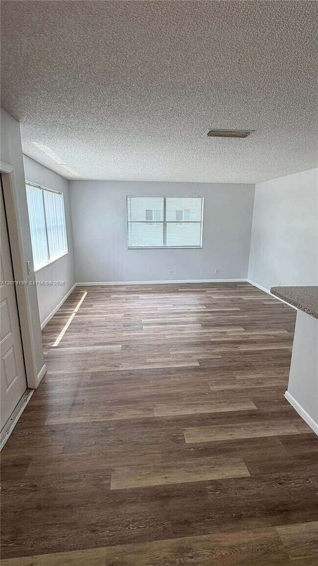 Building Photo - 11641 Royal Palm Blvd
