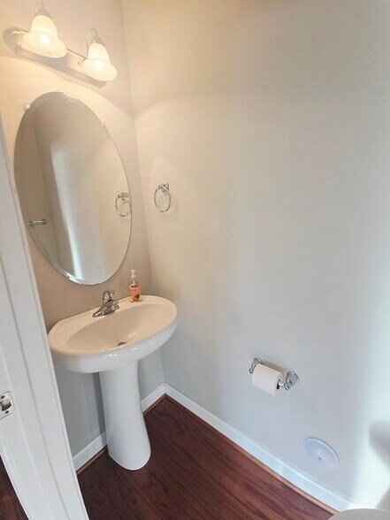 Half bath off of kitchen and living room - 1207 Heritage Links Dr