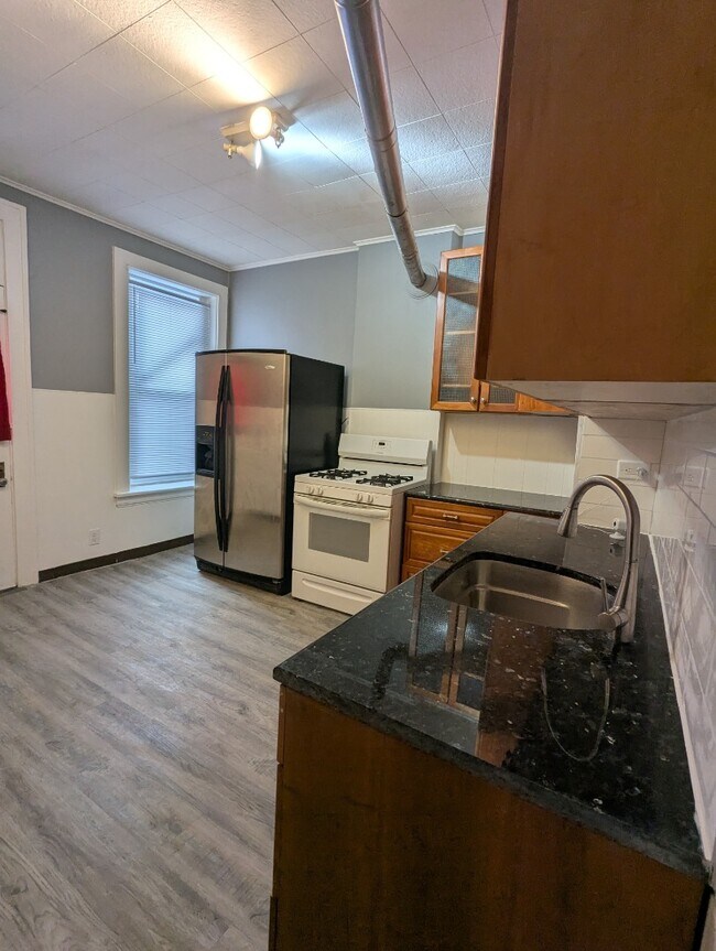 Building Photo - 11339 S Langley Ave