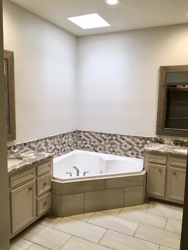 Building Photo - Your Private Retreat in South Lubbock — Two Living Areas, Zero Compromises