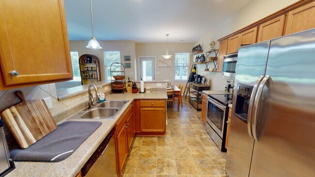 Building Photo - Stylish Two-Story in the dreamy Riverbrook...