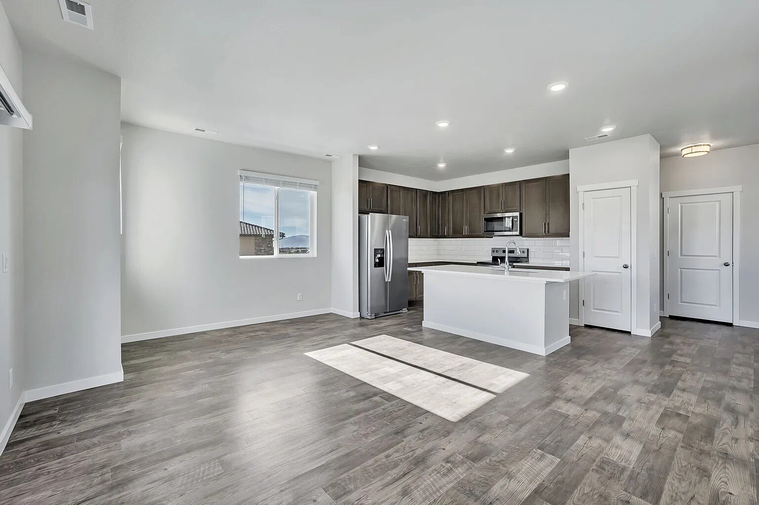 Living Area and Kitchen - 13653 Frost Bitten Grv