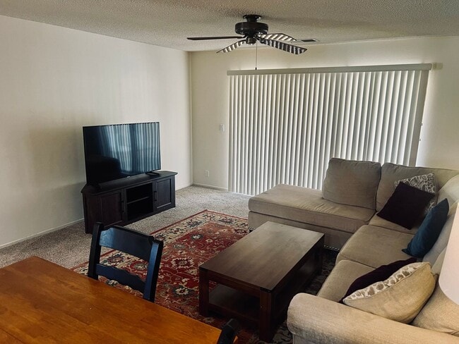Building Photo - Affordable Comfort in 55+ Guard-Gated Comm...
