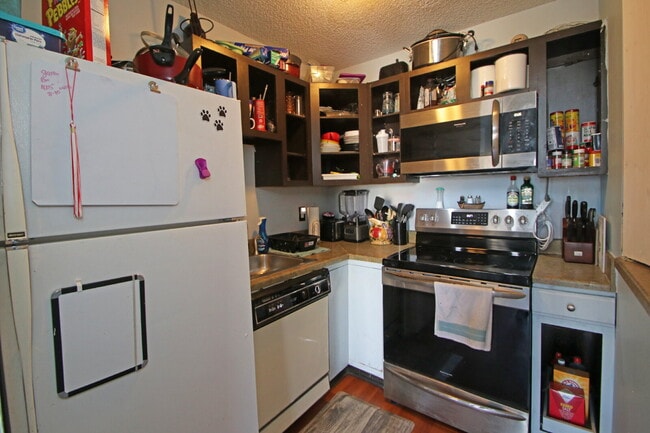 Building Photo - "Rent a room in this 4-Bedroom Furnished T...