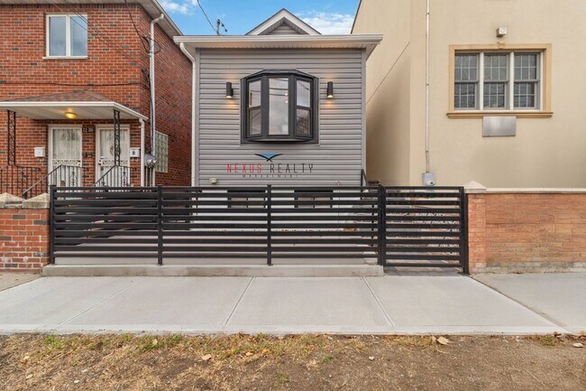 Building Photo - 21-28-28 48th St