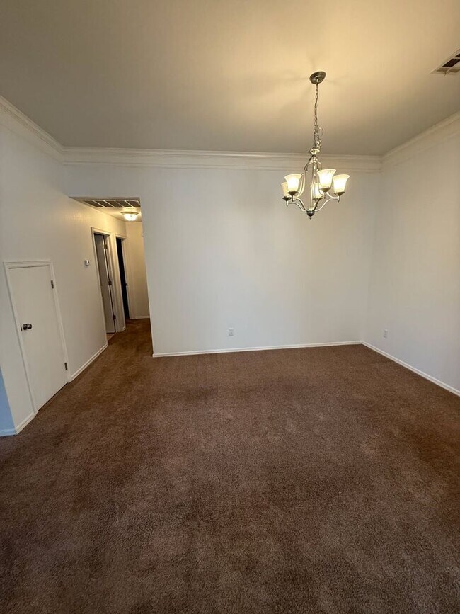 Building Photo - Come make this lovely 4 bedroom 2 bath, 2+...