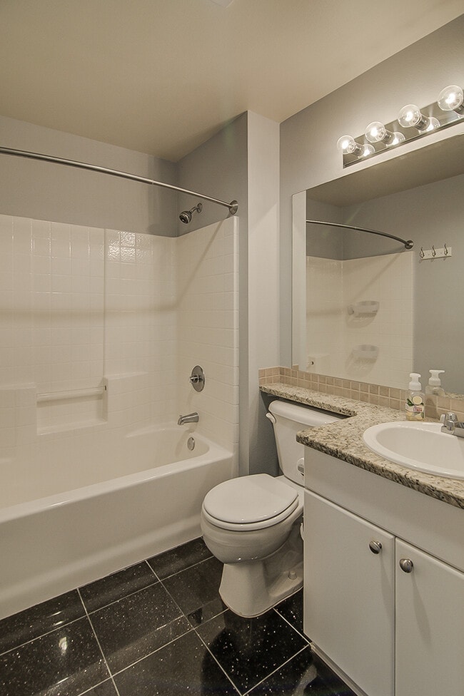 Building Photo - Top floor corner one-bedroom in the heart of it all, don't miss out, tour today!