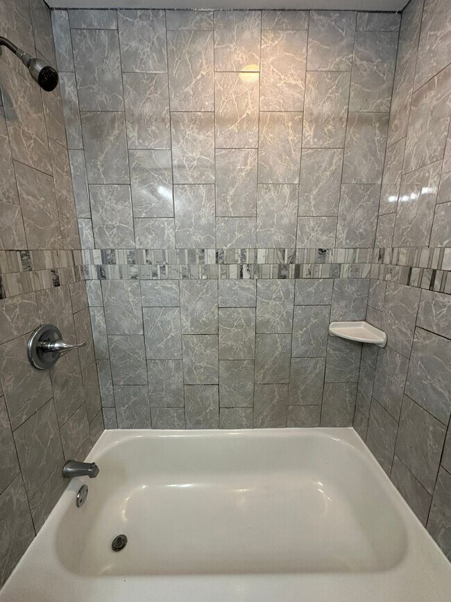 Building Photo - Fully renovated 3 bedroom, one and a half bathrooms