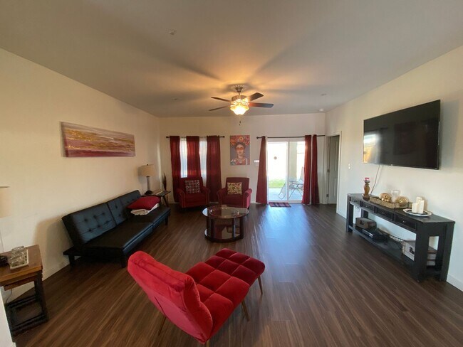 Building Photo - Welcome to the Best Deal in Town. Fully furnished 4 BD 2 BA house on a corner lot