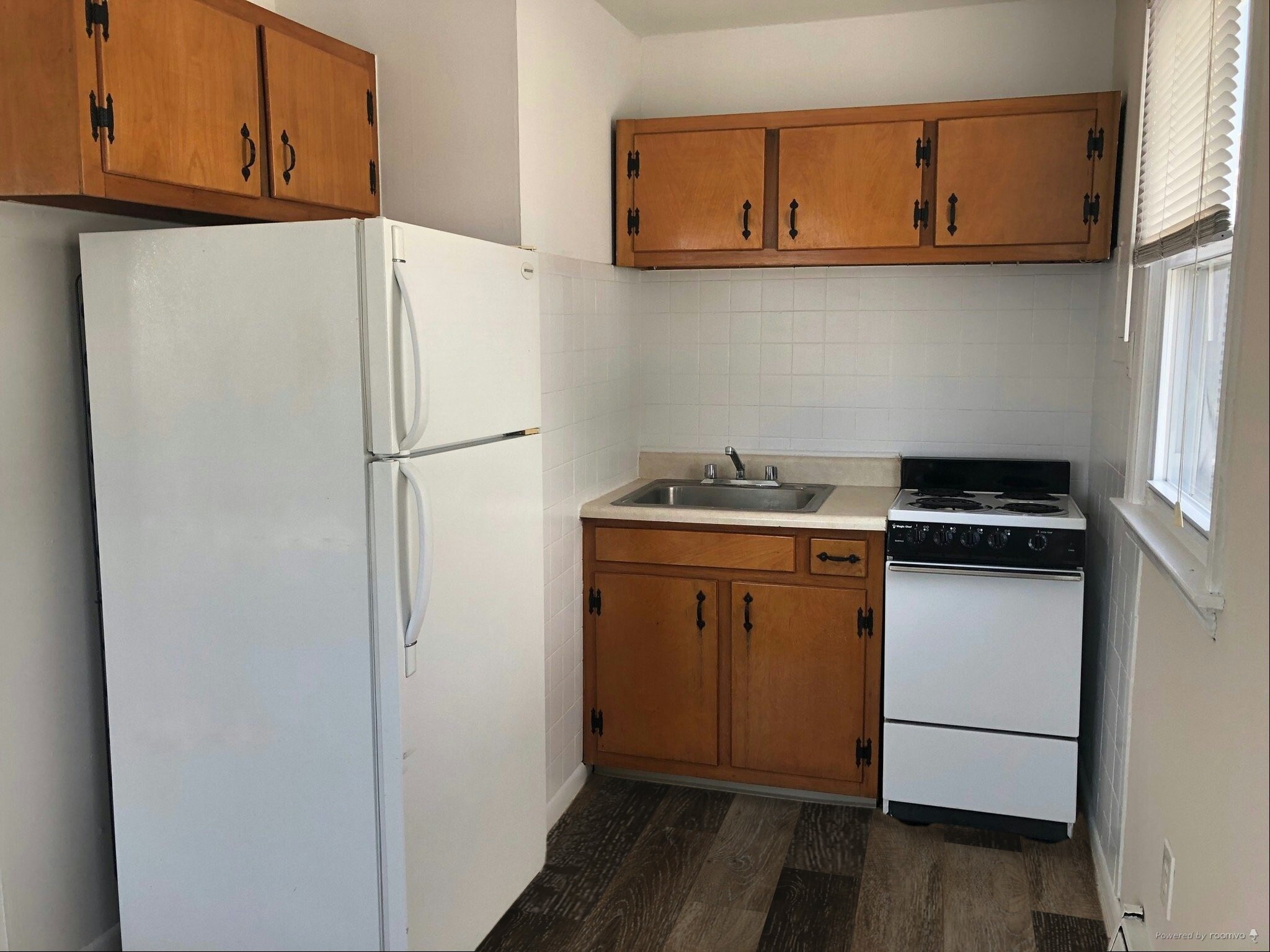 Kitchen Showing Example of New LVP Flooring. Kitchen will have new cabinets, countertops & fridge. - 109 W Brigantine Ave