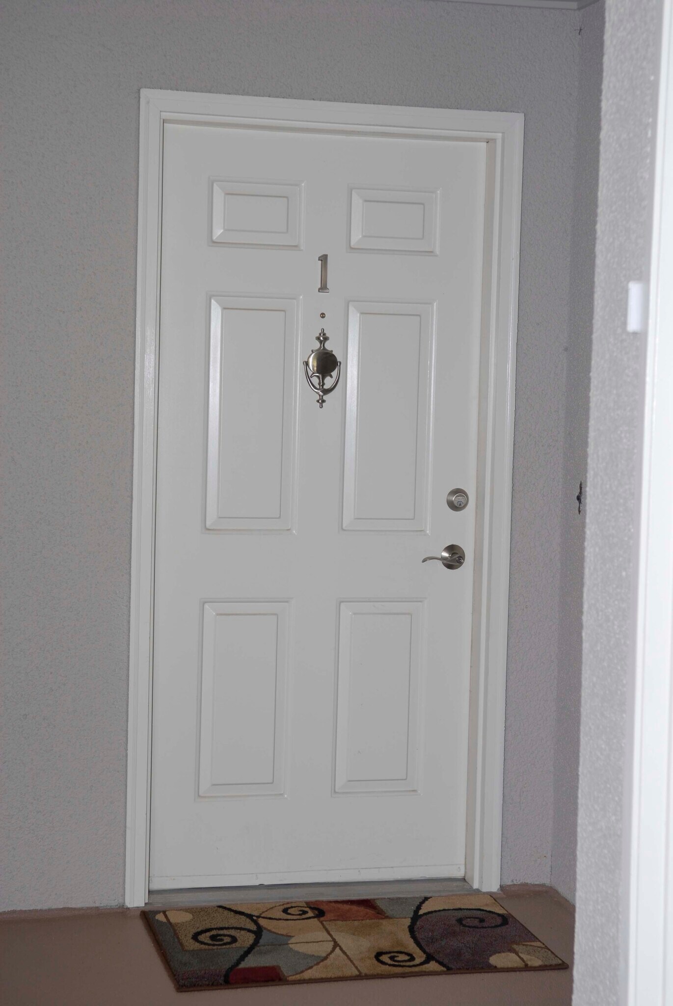 Door to Unit #1 - 11430 99th Pl NE