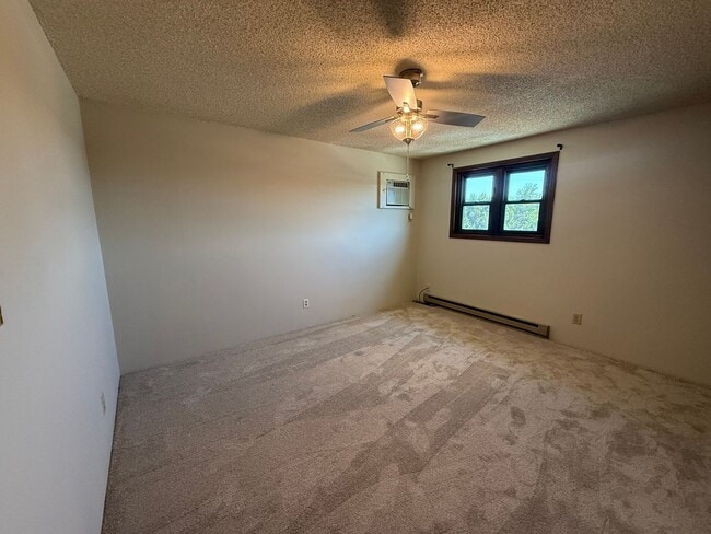 Building Photo - Two Bedroom, One and half bath townhome close to Regional West Medical Center.