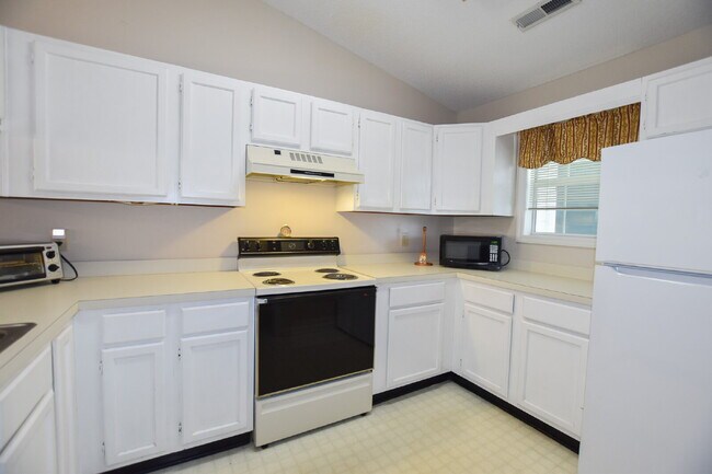 Building Photo - Spacious furnished two, bedroom, two bath Condo.