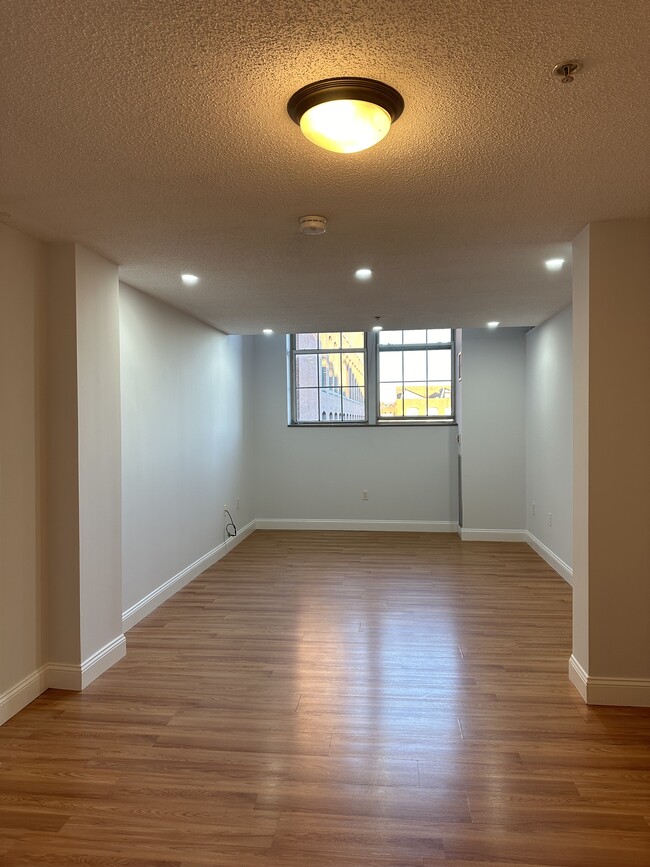 Living room with new lights - 200 Market St