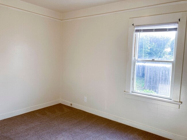 Building Photo - Pet-friendly home with a detached garage!