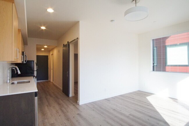 Building Photo - Modern & Chic Corner 1-Bed w/Private Balcony!