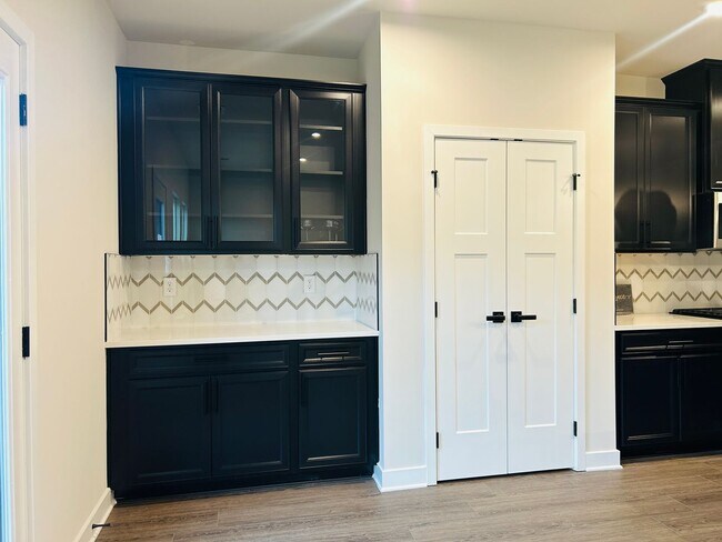 Building Photo - New Construction • 4 BR • 2 Full / 2 Half BA • End Unit Townhome in Village Town – Fayetteville’s...