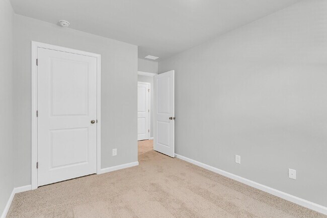 Building Photo - Beautiful Townhome at the Pines of New Hampstead