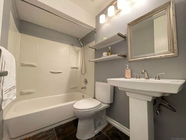 Building Photo - Updated Gated Condo with Pool Access Near SDSU & Shopping
