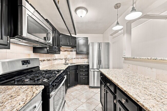 Building Photo - 1,795.95, 2-bedroom, 1-bathroom Updated in Great Denver Location!
