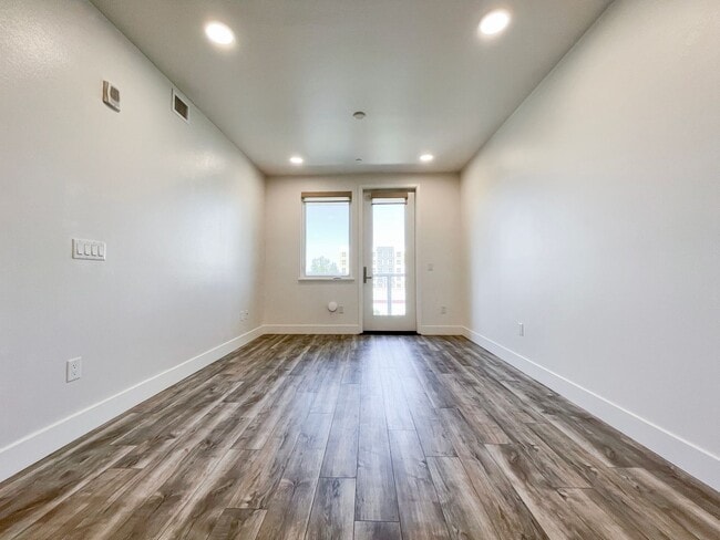 Building Photo - Modern 2BD Fremont Condo – EV Charger, Balcony, & Walk to BART