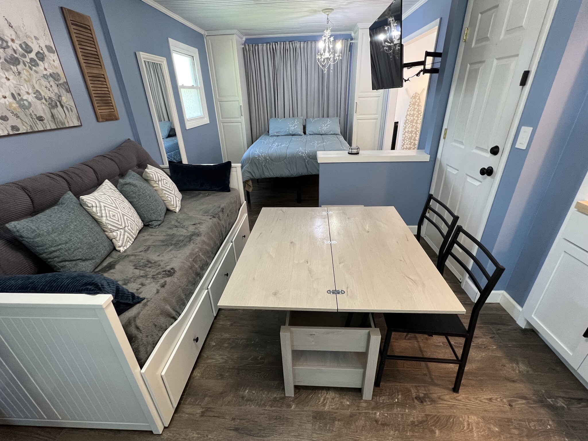 The coffee table converts to a small table for puzzles, games, or meals. - 908 Lake Rd