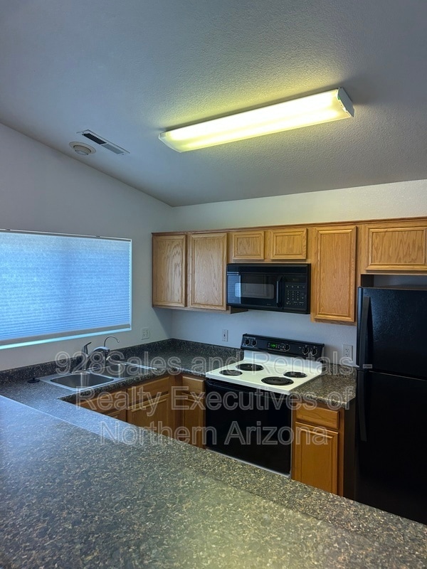 Building Photo - 6485 E Settlers Run Rd