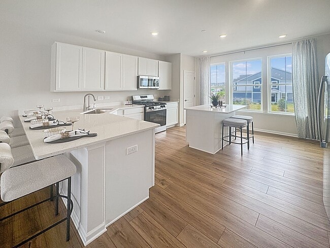 Building Photo - Brand new construction, end unit townhome!