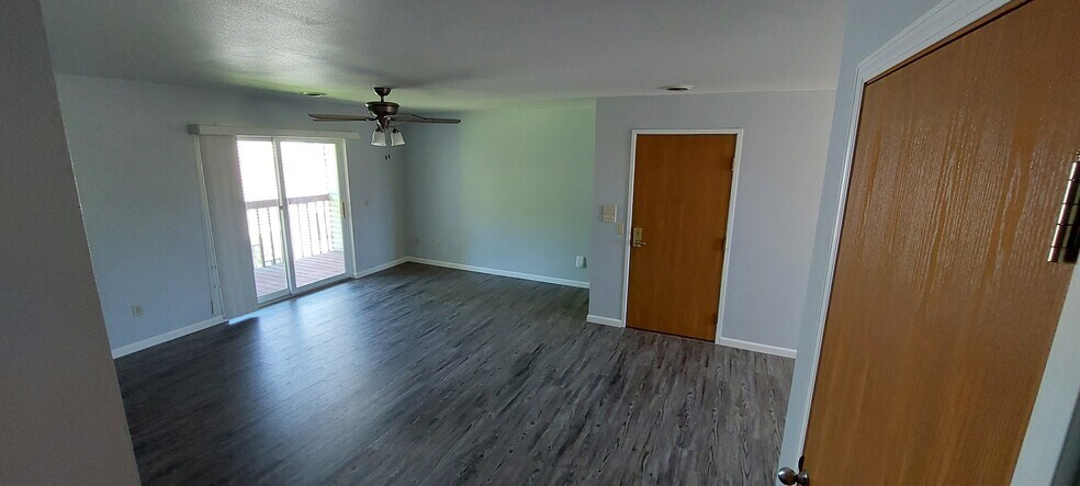 Living room w/Patio - 6658 Charlie Grimm Rd