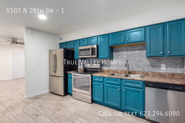 Building Photo - 5107 N 28th Dr