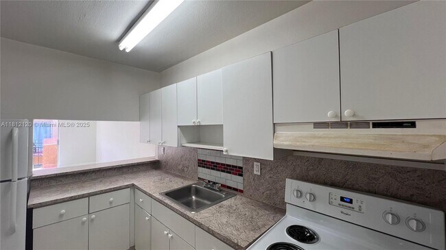 Building Photo - 3675 W 11th Ave