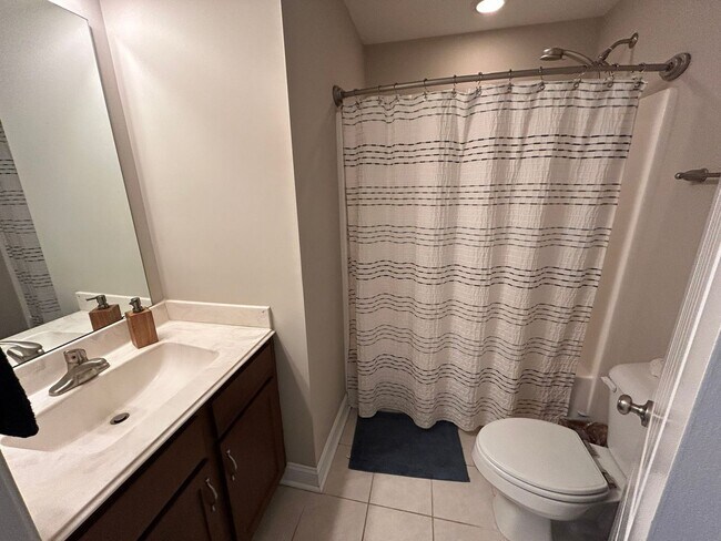 Building Photo - Enjoy private living in this beautiful 3 bedroom, 2.5 bathroom home on almost half acre lot!