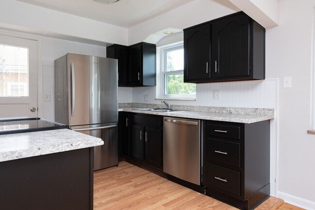 Building Photo - WESTWOOD-4 BEDROOM 2 BATH WITH OPEN FLOOR ...