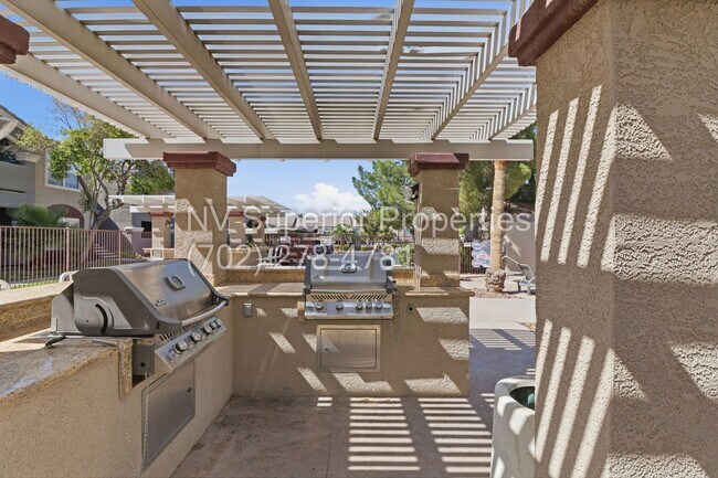 Building Photo - SW!! First floor unit with Balcony!! Gated!! Clubhouse!!  Community pool!! Spa!! Exercise Room!! ...