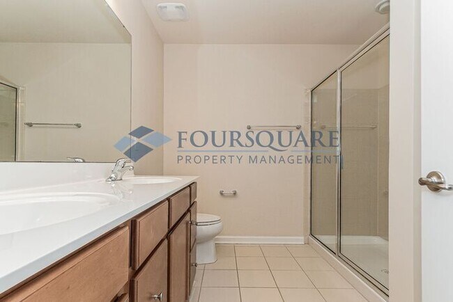 Building Photo - Spacious 3-Bed End Unit Townhome with 2-Car Garage & Private Patio | Prime Kitts Creek Location