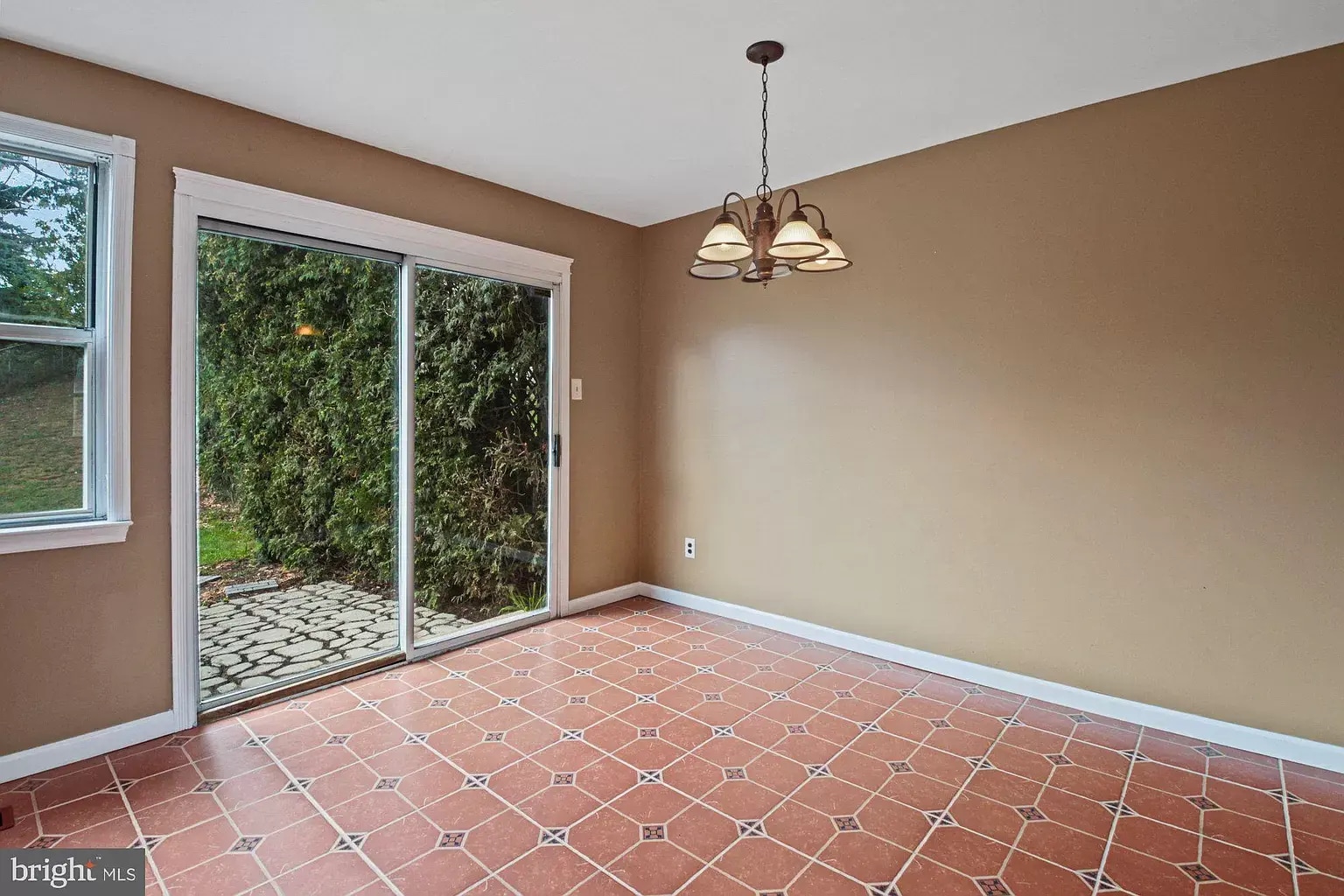 Patio view from dining area - 1 Dogwood Ln