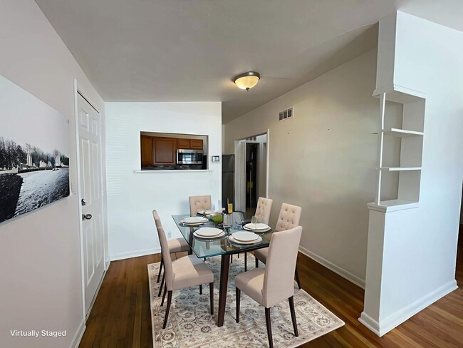 Building Photo - Charming 2 Bedroom, 1 Bathroom Duplex in A...