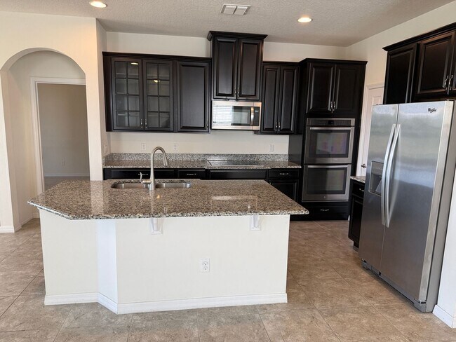 Building Photo - BEAUTIFUL 4 BEDROOMS, 3 BATHS,  SINGLE FAMILY HOME IN HARVEST LANDING IN CLERMONT