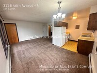 Building Photo - 311 E 46th Ave