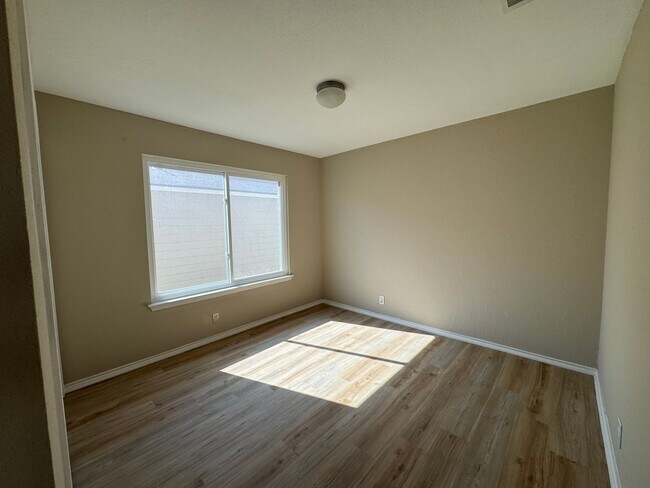 Building Photo - NEW PAINT, FLOORING, APPLIANCES & ROOF  | ...