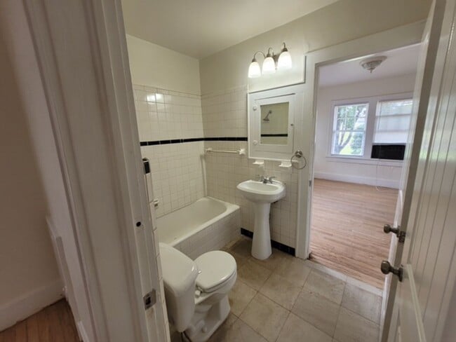 Building Photo - Super Charming - Wood Floors Throughout